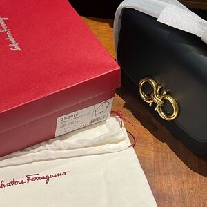 Salvatore Ferragamo Trapezio Black Bag with Gold Accents